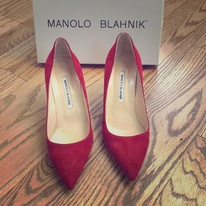 Red Suede Manolo Blahnik heels.